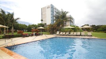 Outdoor pool, pool umbrellas, sun loungers