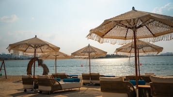 Private beach, white sand, beach cabanas, sun-loungers