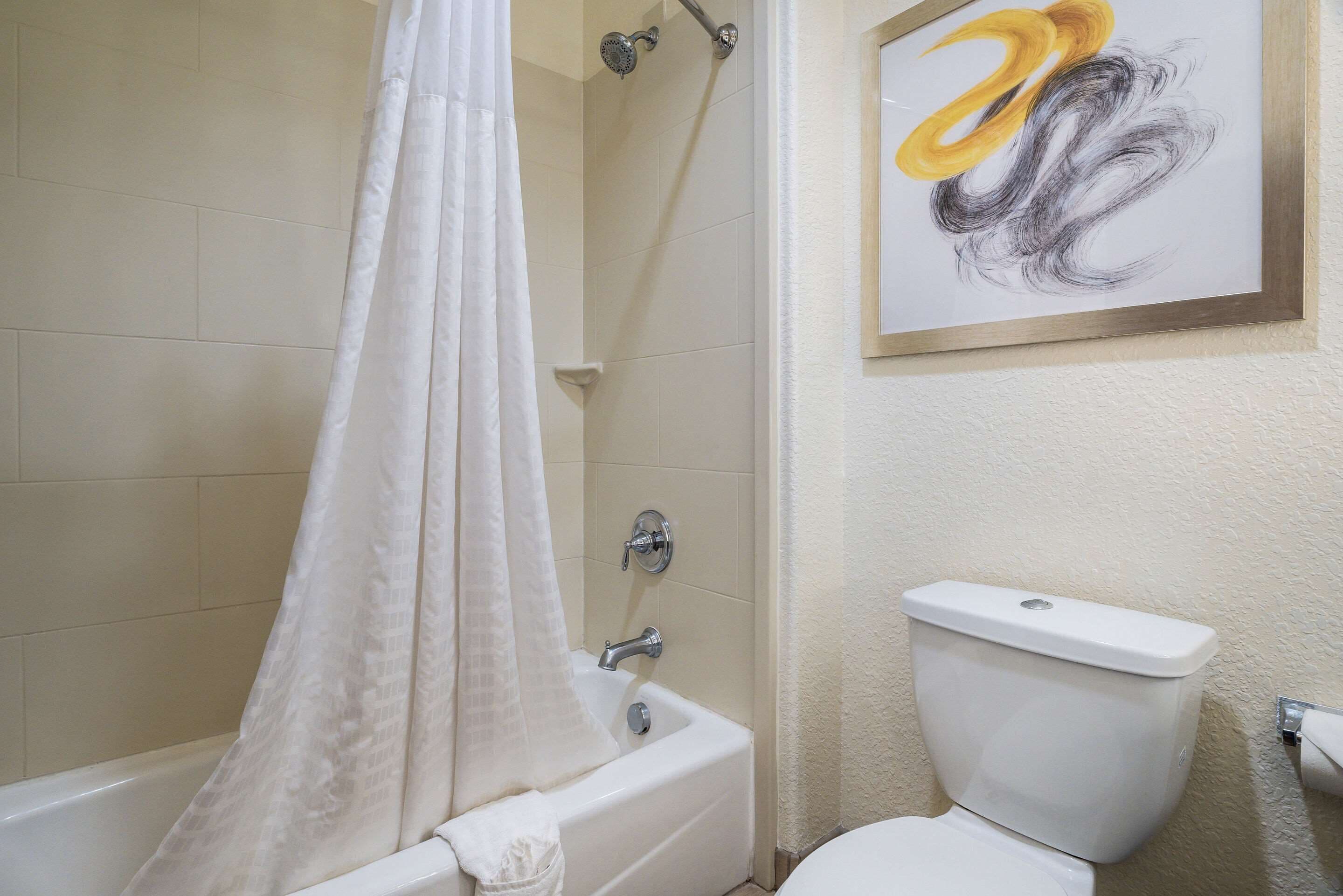 combined shower/bathtub, deep-soaking bathtub, free toiletries