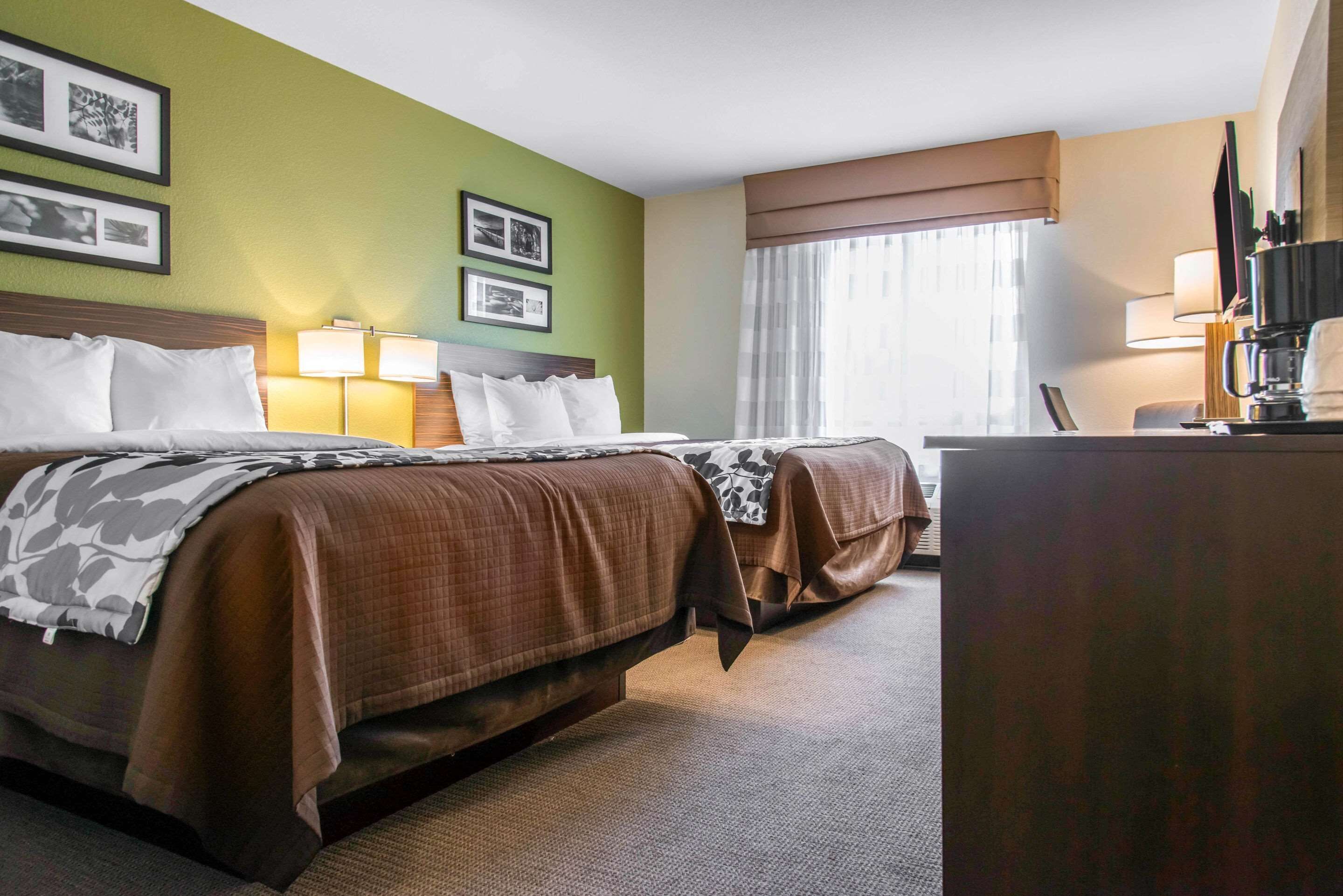 standard room, 2 queen beds, non smoking | in-room safe, desk, iron/ironing board, free cots/infant beds