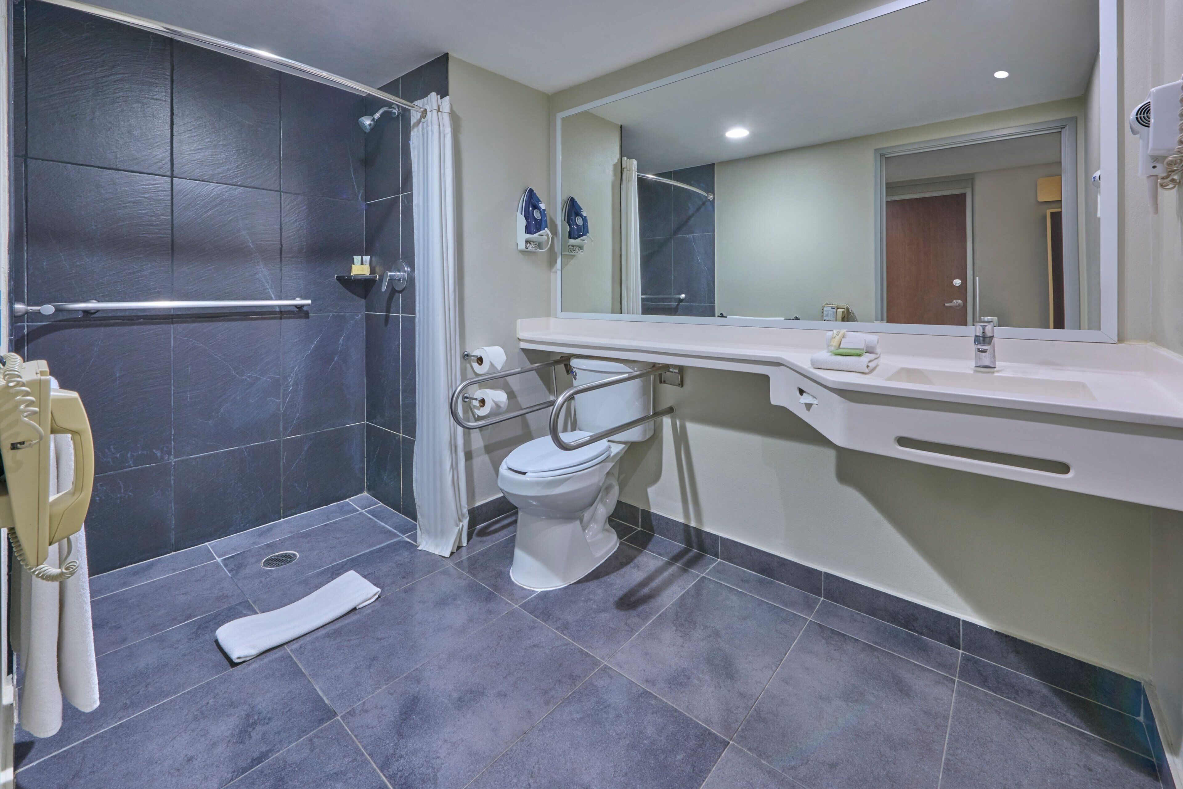 room, 1 queen bed, non smoking | bathroom | shower, free toiletries, hair dryer, towels