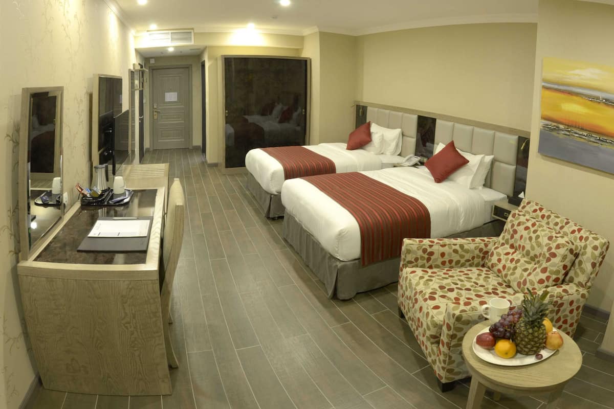 superior room, 2 queen beds, non smoking | minibar, in-room safe, desk, laptop workspace
