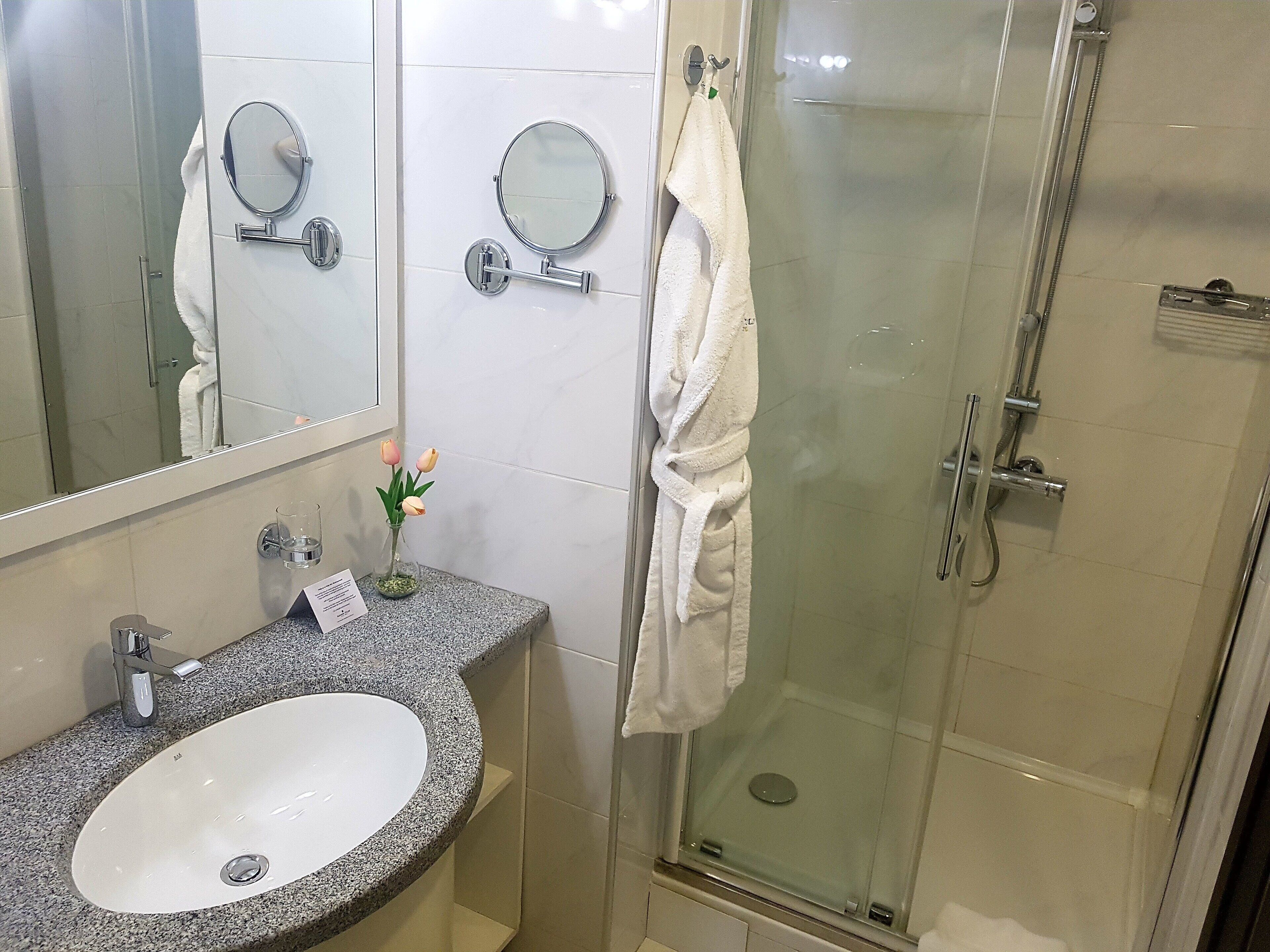 superior room, 1 king bed, non smoking | bathroom | bathtub, hair dryer, bathrobes, towels