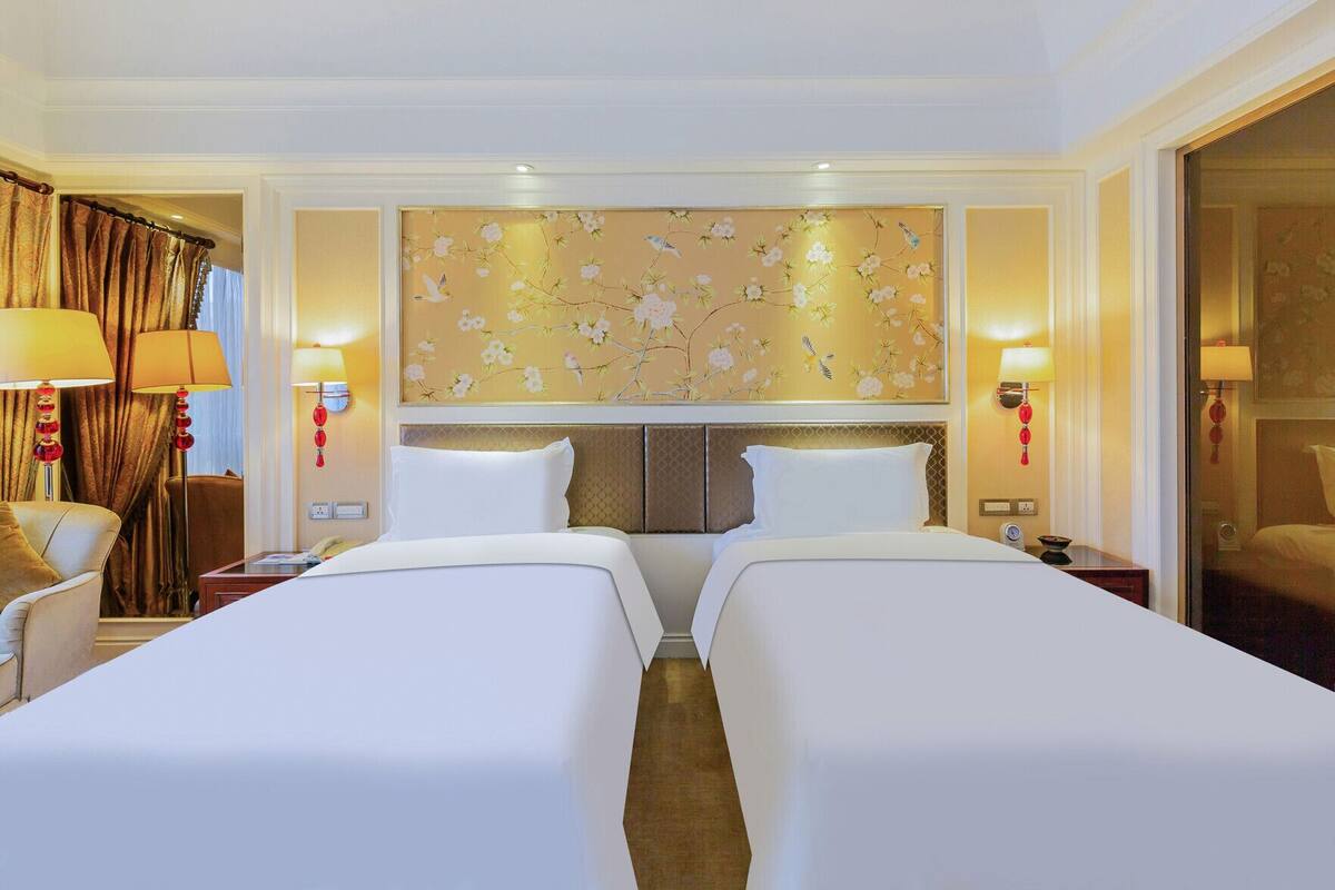 Premium bedding, down comforters, pillowtop beds, minibar
