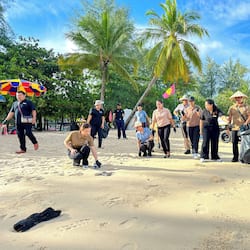 Beach nearby, white sand, beach umbrellas, beach towels