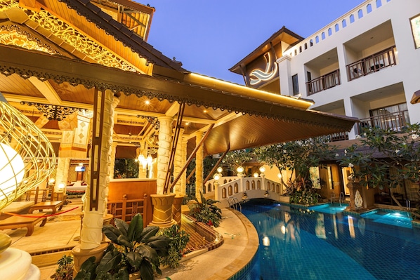 Outdoor pool, open 7:00 AM to 9:00 PM, free pool cabanas, pool umbrellas
