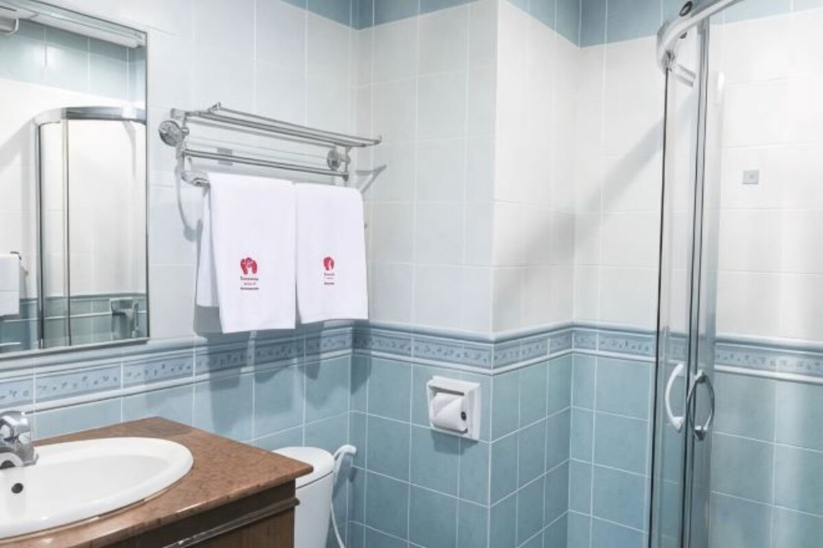 Bathroom | Shower, free toiletries, hair dryer (on request), slippers