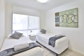 Standaard appartement, 2 slaapkamers | Een strijkplank/strijkijzer, gratis wifi, beddengoed