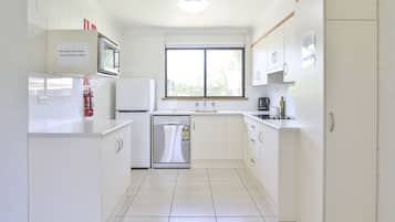 Standard Apartment, 2 Bedrooms | Private kitchen | Fridge, microwave, toaster, cookware/dishes/utensils