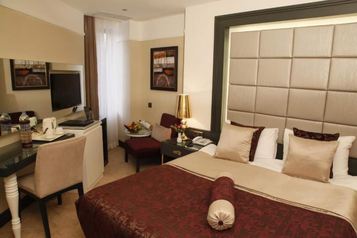 Roupas de cama premium, frigobar (abastecido com alguns itens grátis)