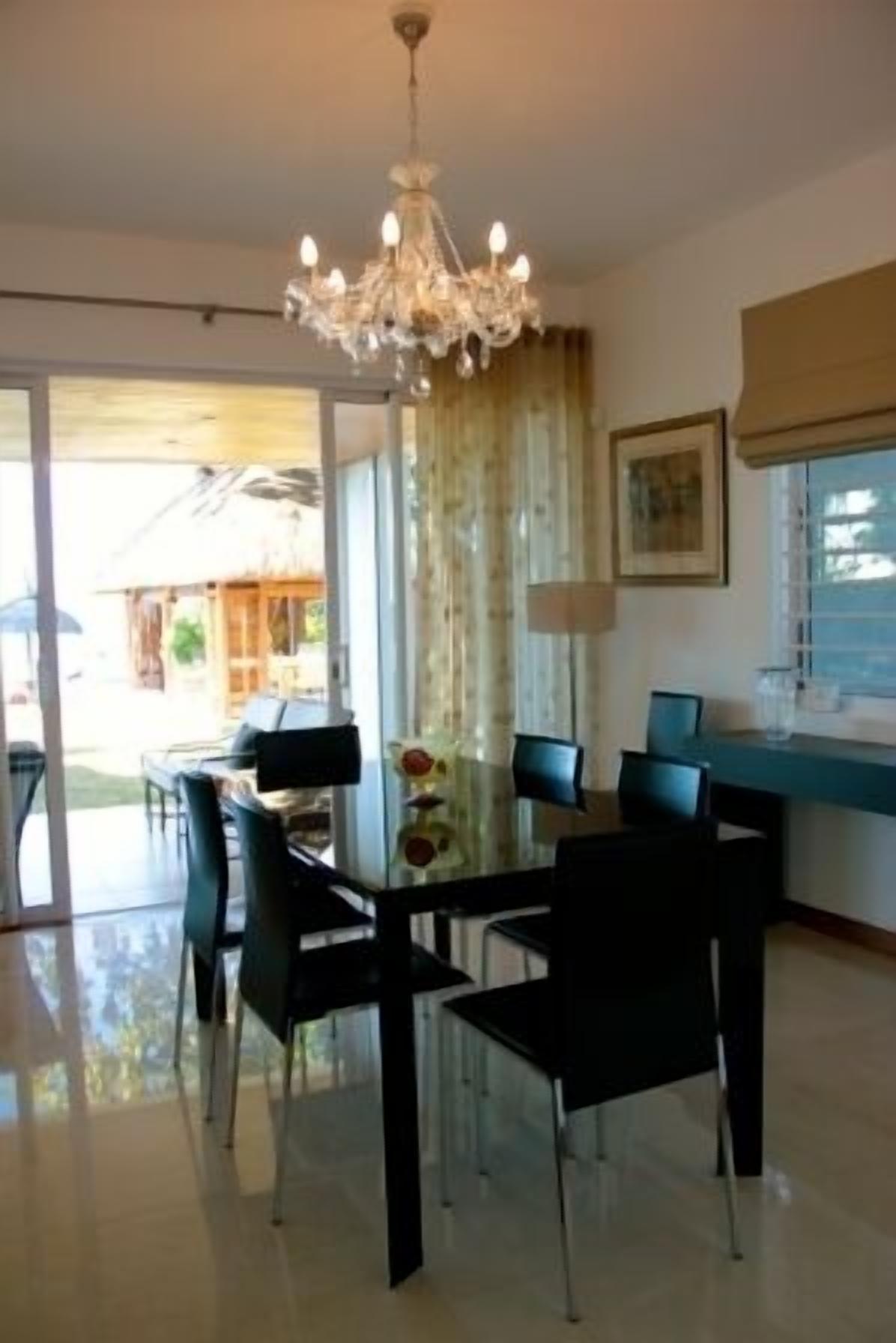 Villa, 4 Bedrooms, Beach View | In-room dining