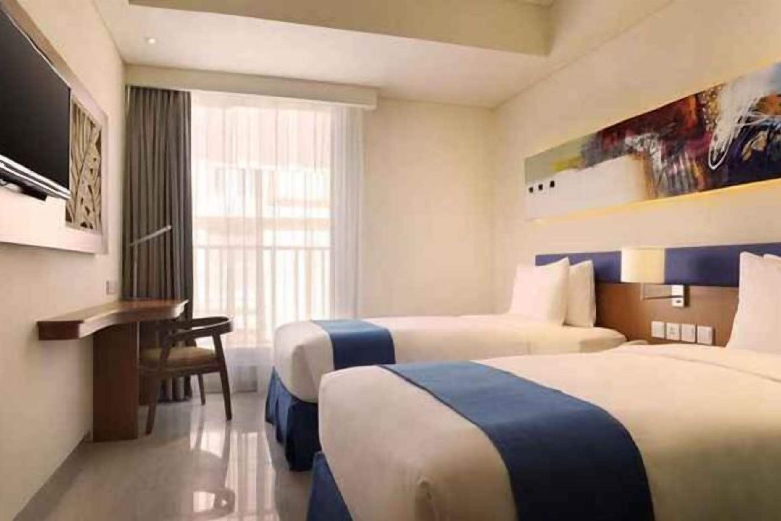 Premium bedding, down comforters, pillowtop beds, minibar