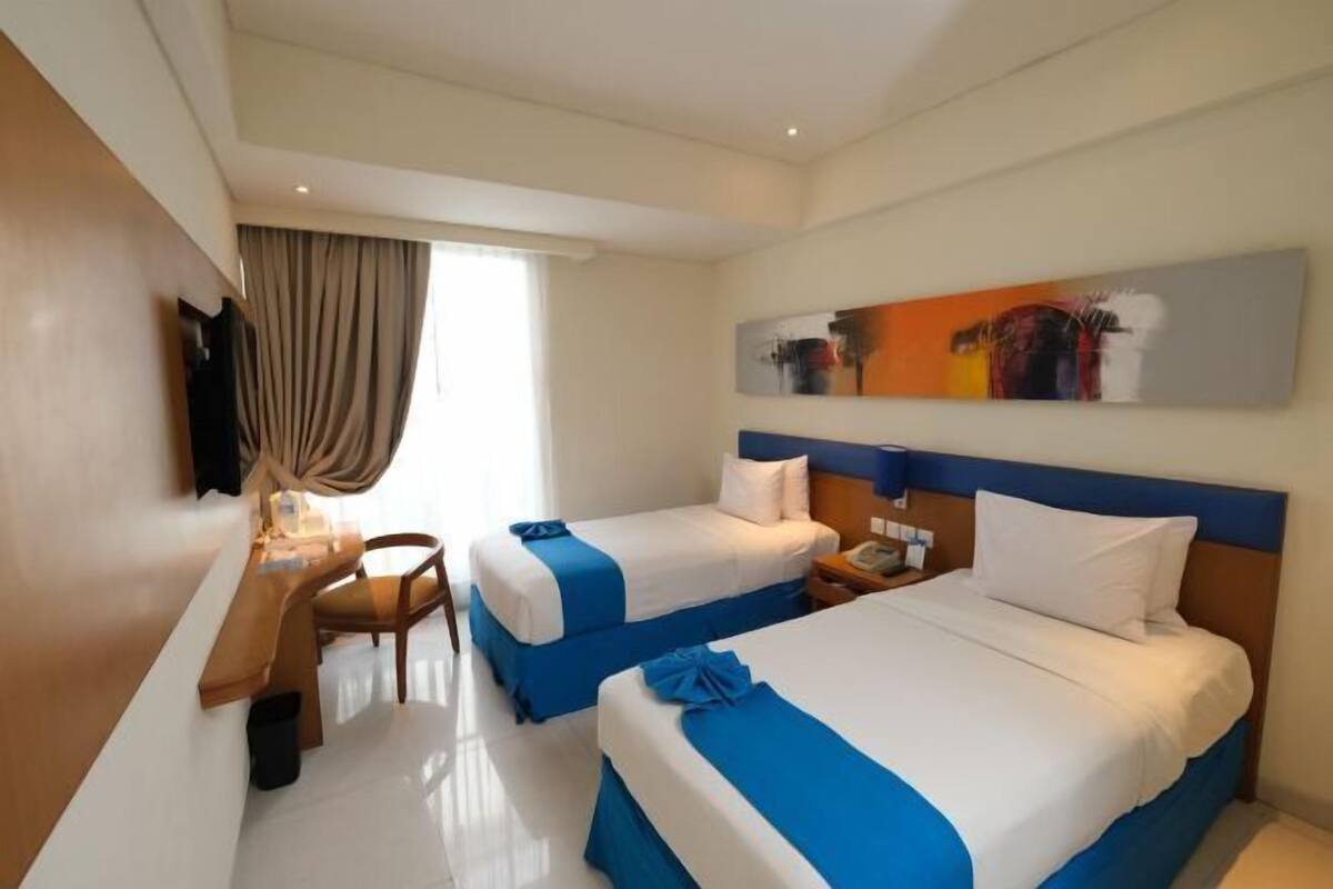 Premium bedding, down comforters, pillowtop beds, minibar