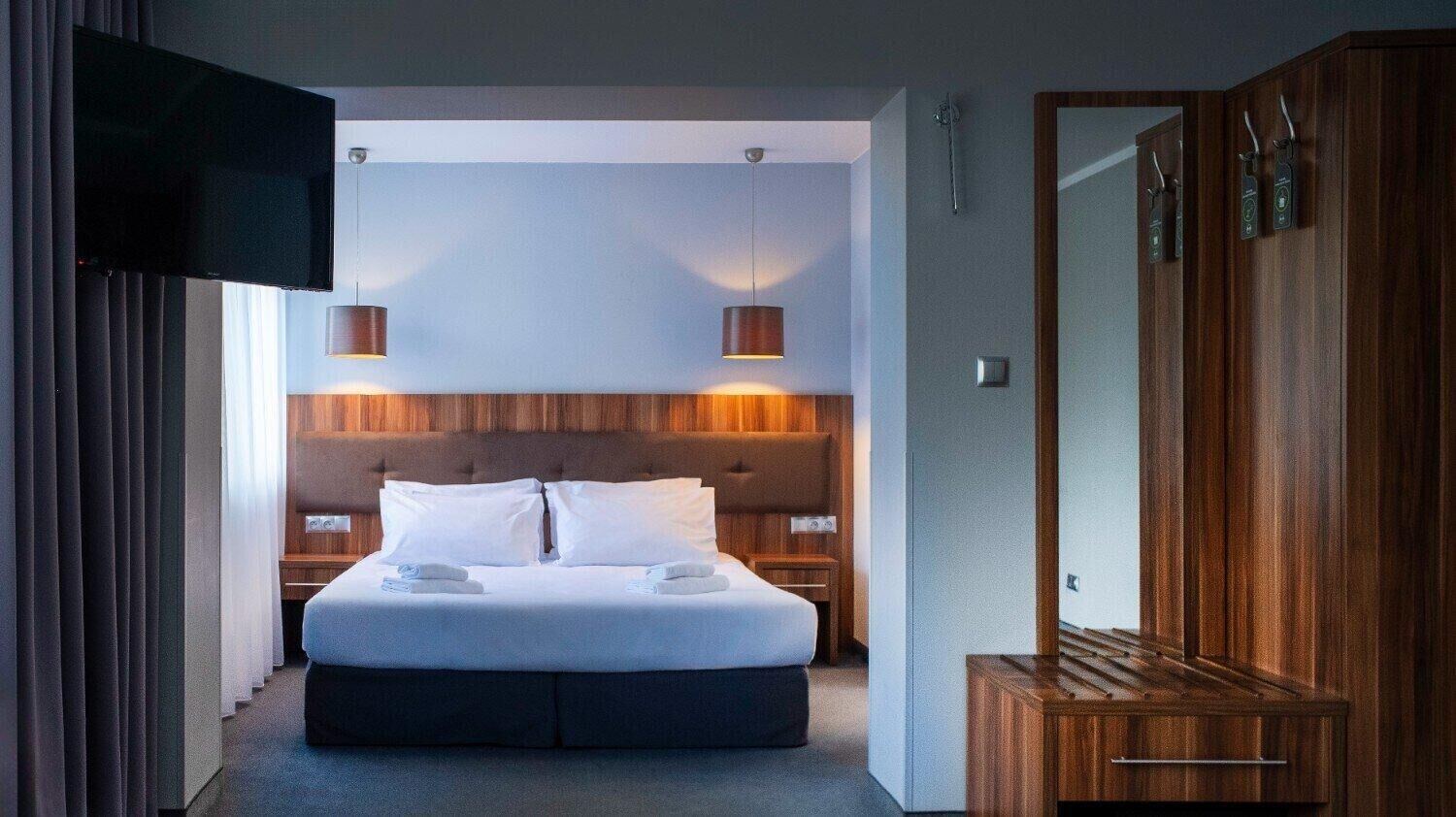 Hypo-allergenic bedding, desk, laptop workspace, iron/ironing board