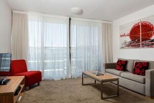 Apartment, 1 Bedroom | 1 bedroom, individually decorated, individually furnished, desk