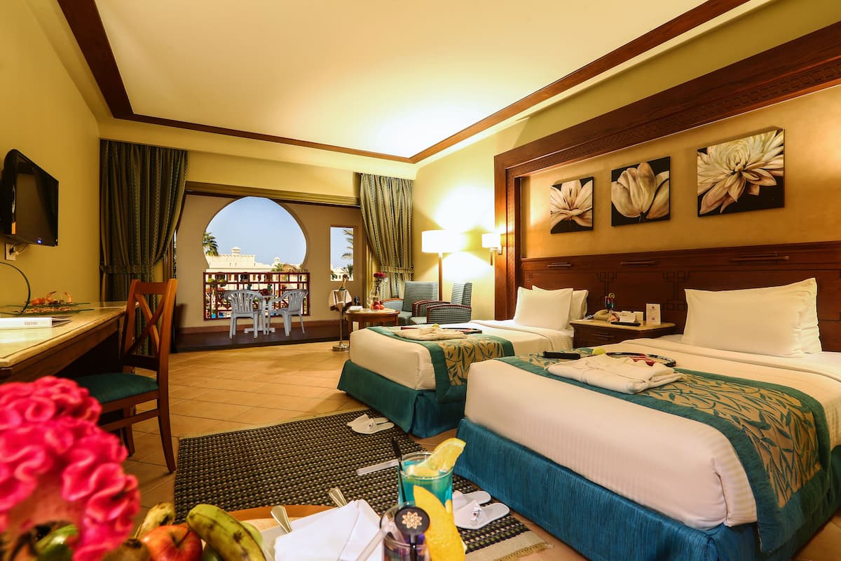 Sábanas de algodón egipcio y minibar