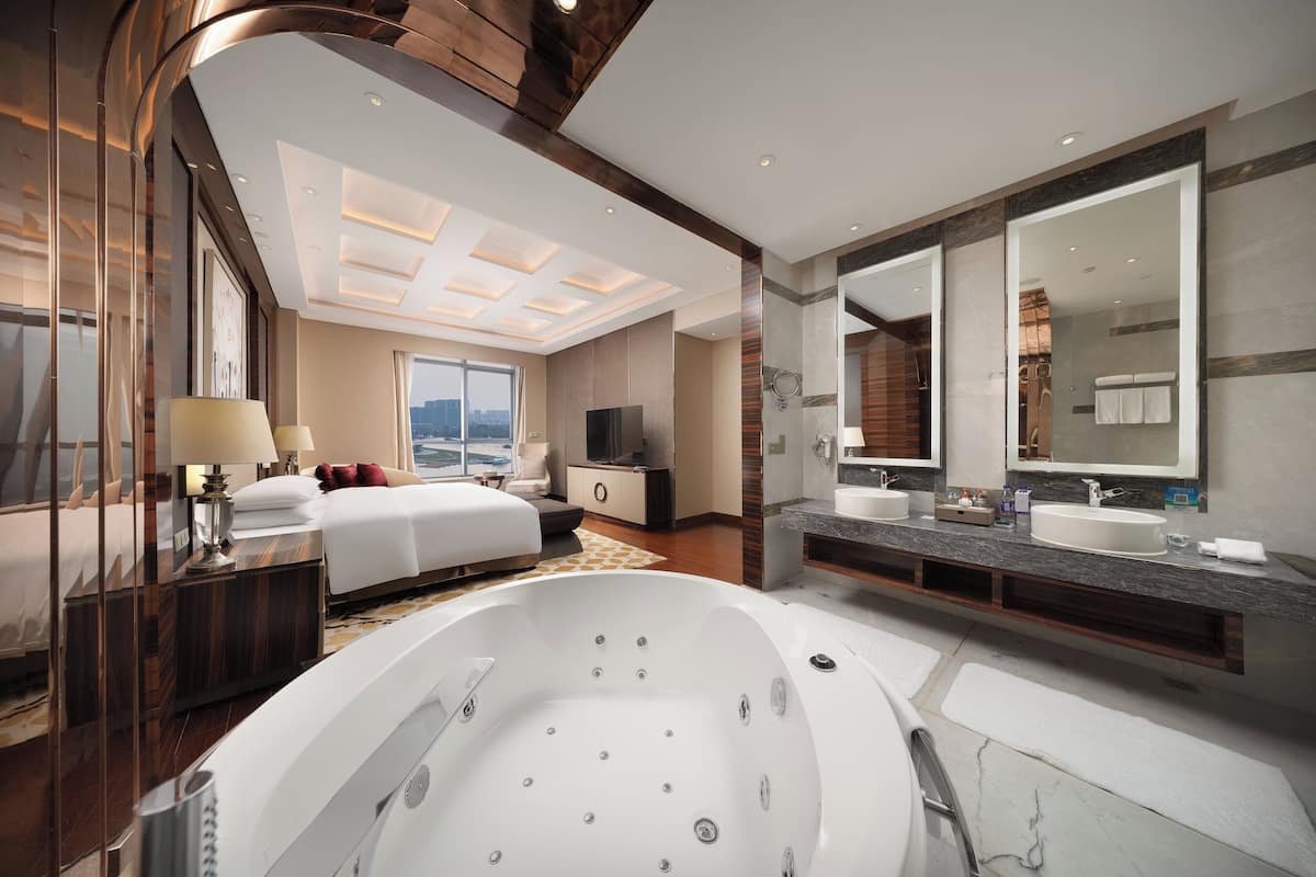 presidential suite, 1 king bed | bathroom | separate bathtub and shower, hair dryer, bathrobes, slippers