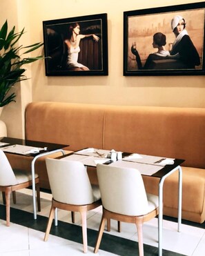 Daily buffet breakfast (USD 22 per person)