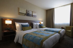 Ropa de cama de alta calidad y minibar 