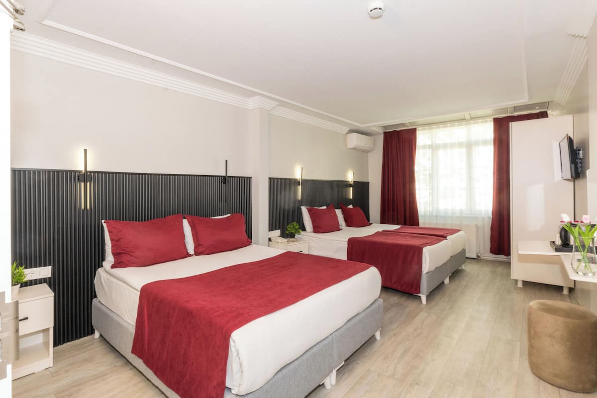 Family Quadruple Room, 1 Bedroom | 2 bedrooms, premium bedding, minibar, in-room safe
