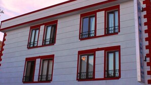 A hotel building with a sign reading "AVCILAR INCI HOTEL". - Avcilar Inci Hotel (Istanbul)