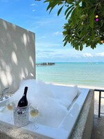 Beach Front Villa with One way Airport Transfer | Private spa tub