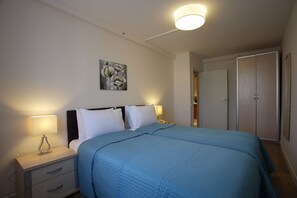 Suite Eksekutif, 2 kamar tidur | 1 kamar tidur, seprai premium, minibar, dan brankas