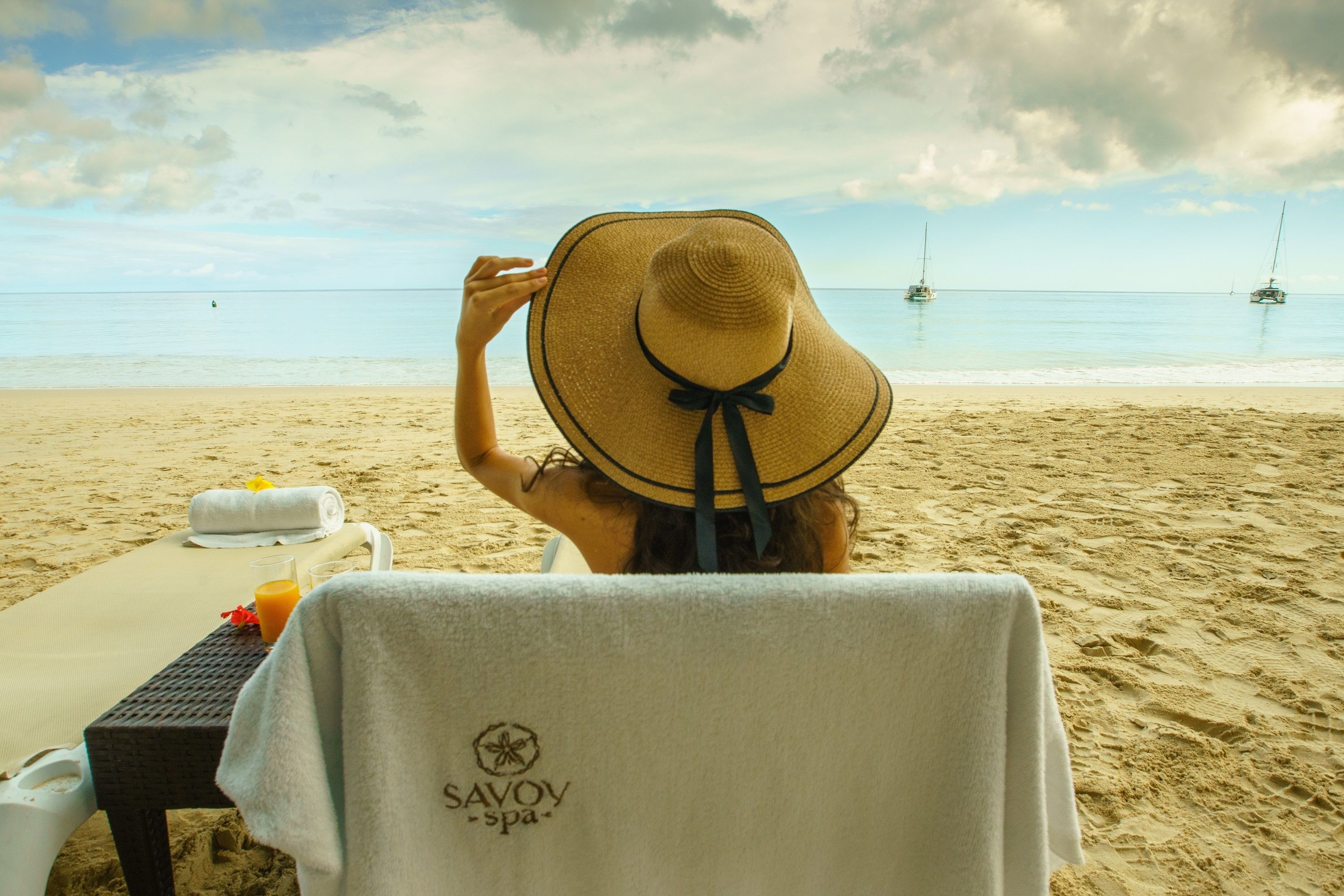 On the beach, sun loungers, beach towels, beach yoga