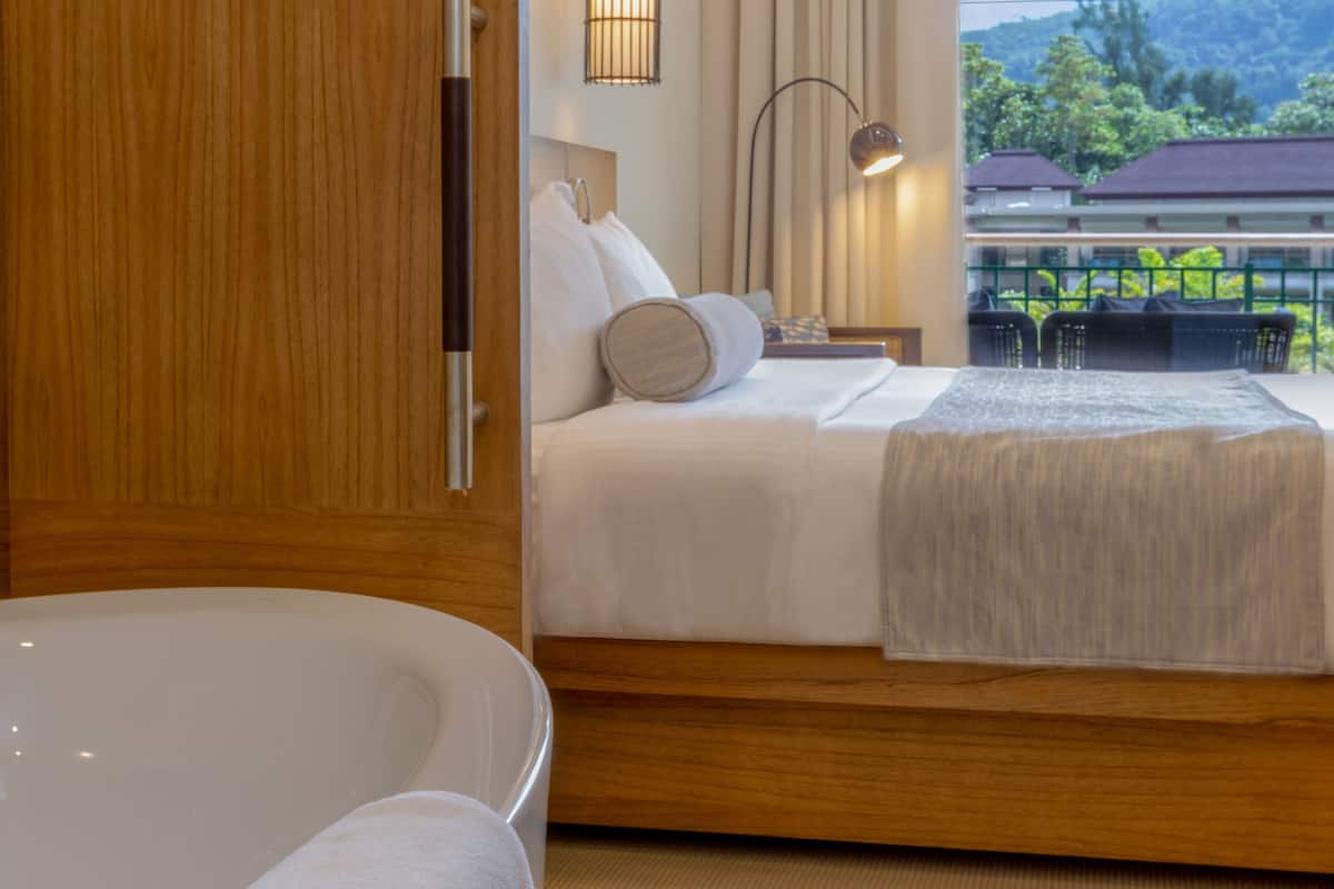 grand room (savoy deluxe, pool) | bathroom | separate bathtub and shower, rainfall showerhead, free toiletries