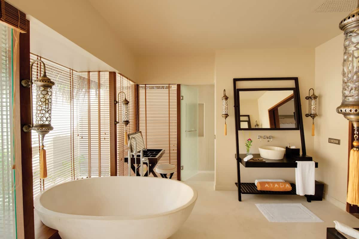 separate bathtub and shower, deep-soaking bathtub, rainfall showerhead