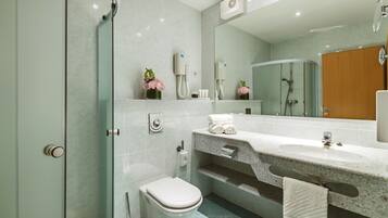 Shower, free toiletries, slippers, towels