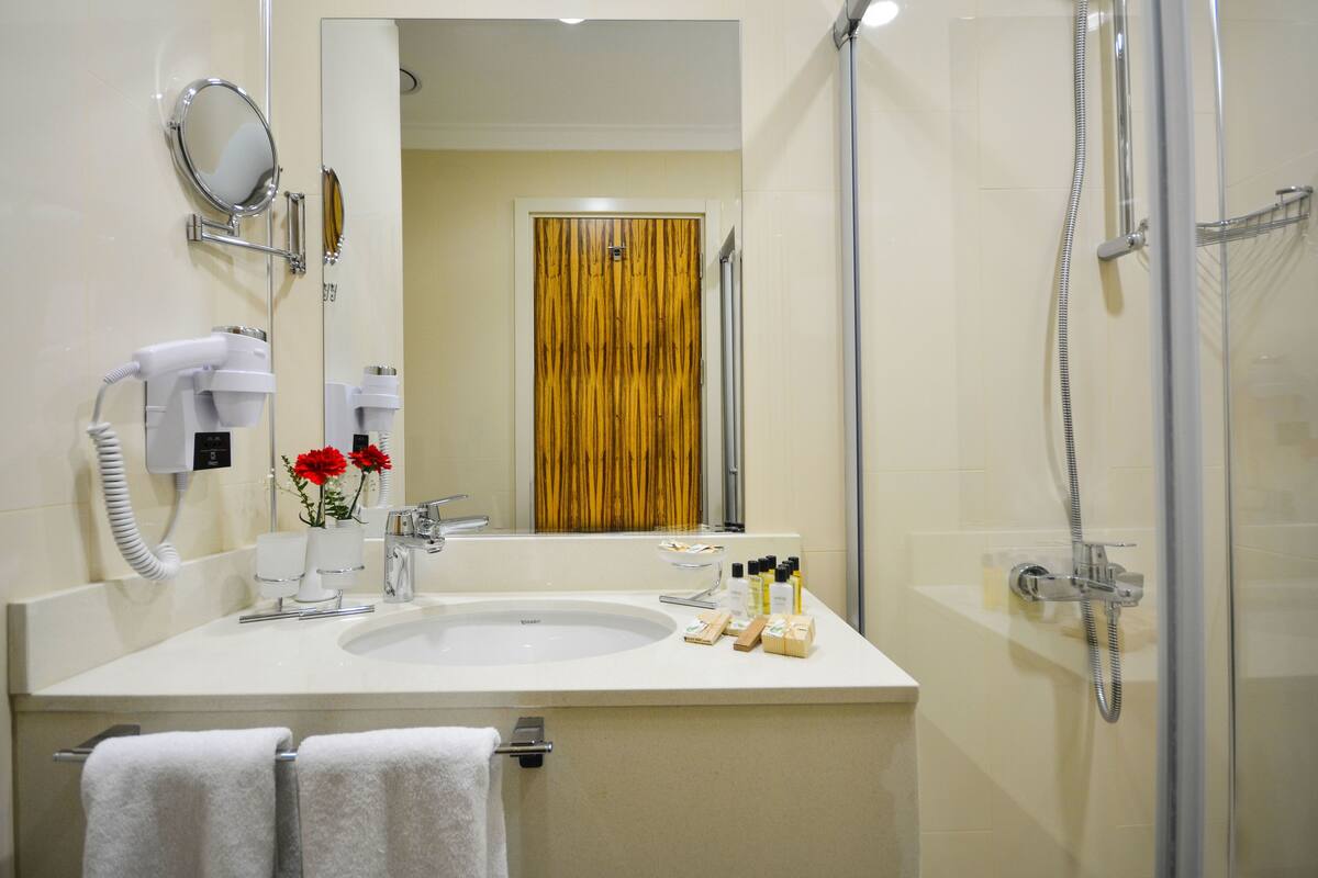 rainfall showerhead, free toiletries, hair dryer, bathrobes