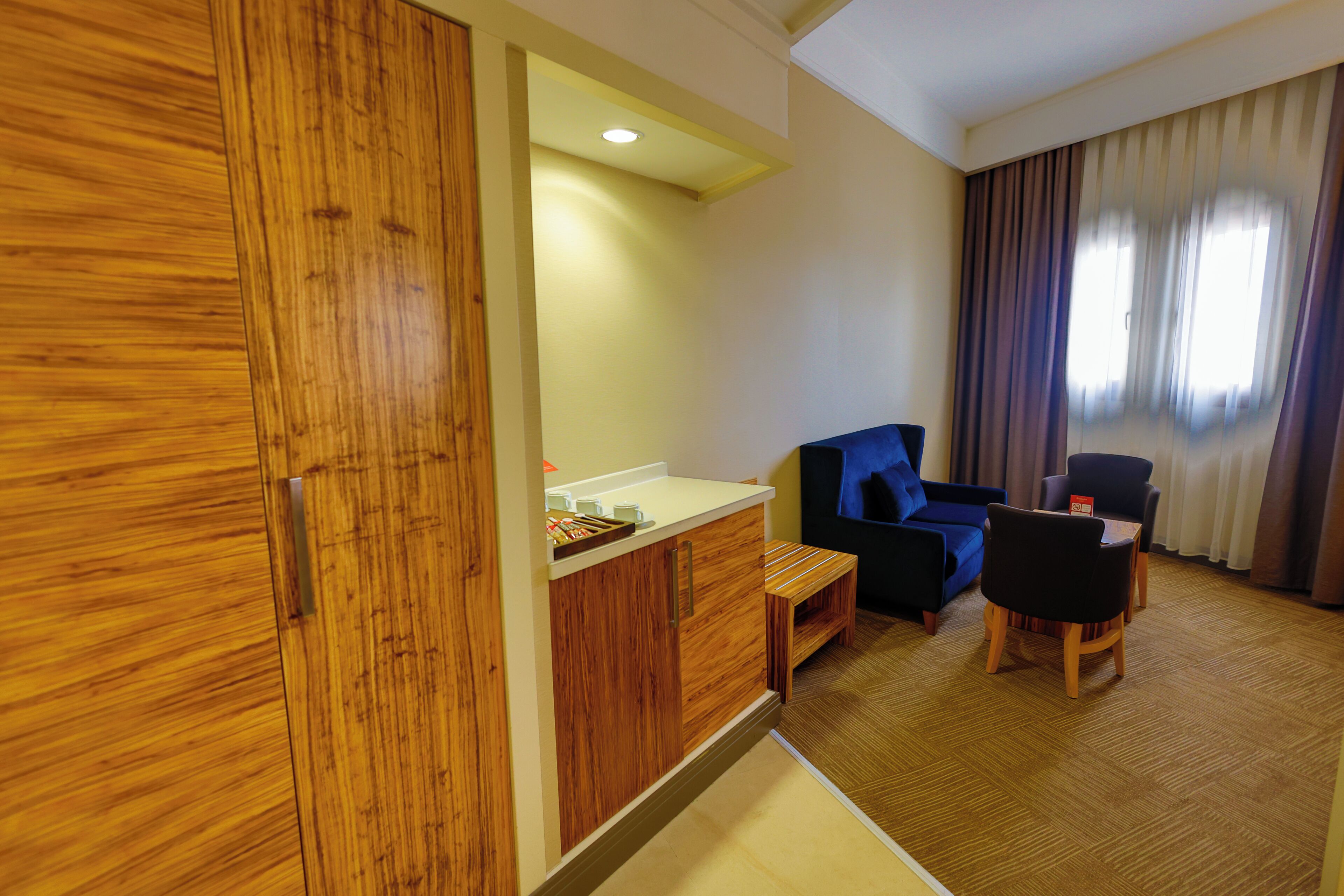 junior suite | living area | 32-inch led tv with satellite channels, tv