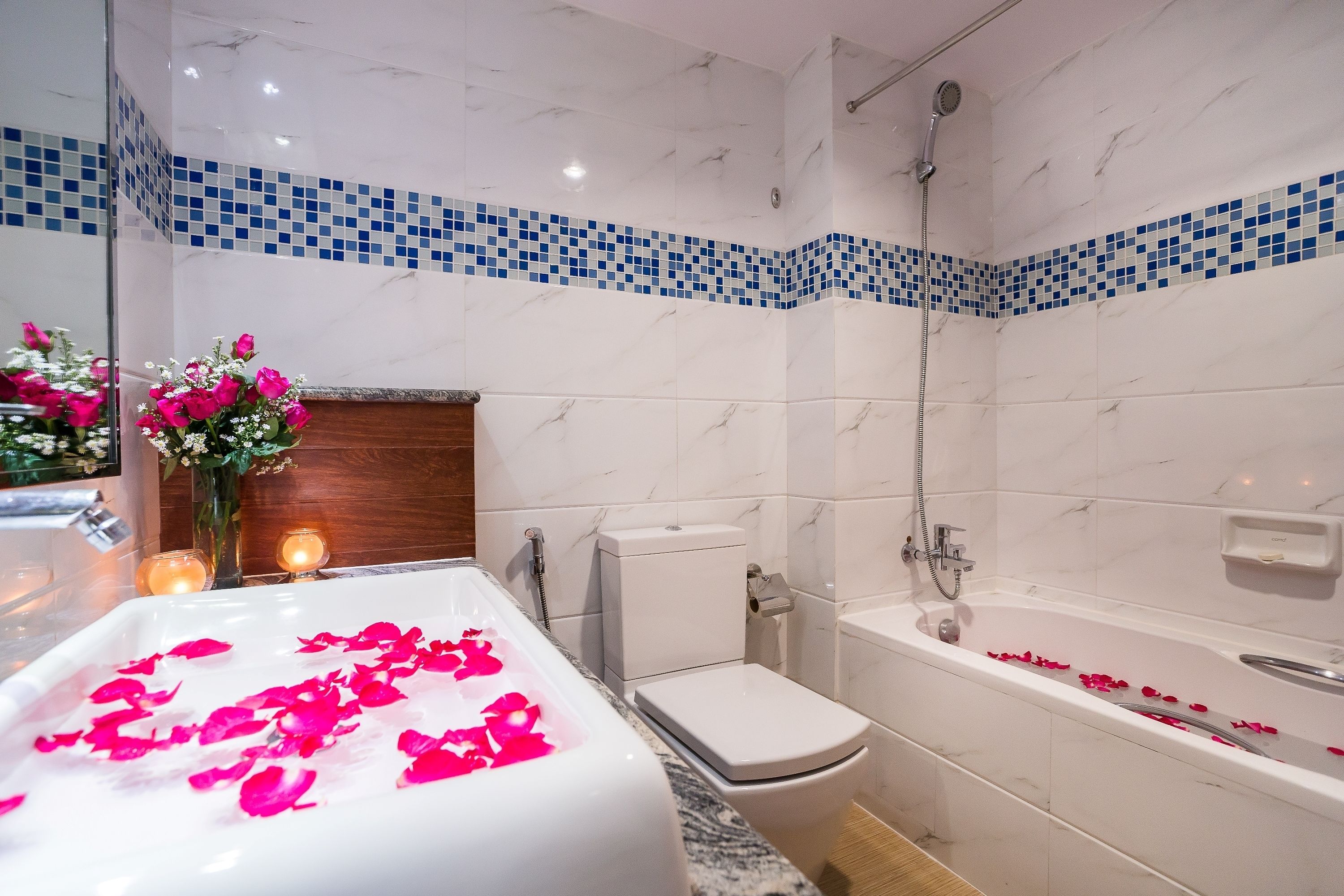 deep-soaking bathtub, rainfall showerhead, free toiletries, hair dryer