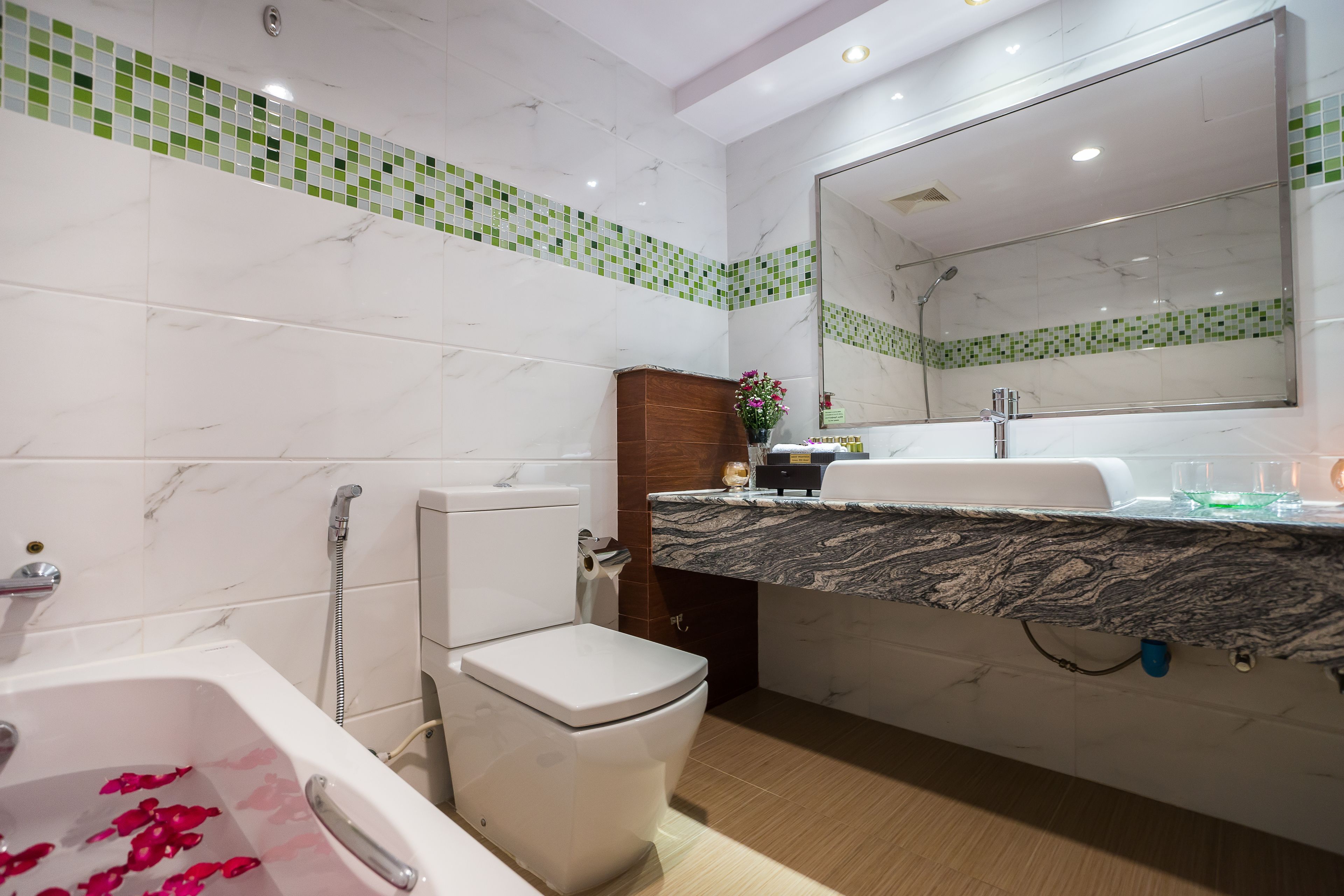 deep-soaking bathtub, rainfall showerhead, free toiletries, hair dryer