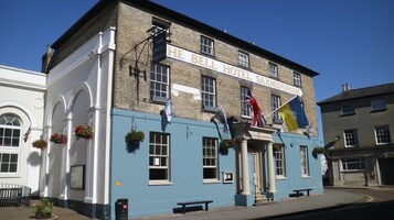 A building with a sign reading "The Bell Hotel Saxmundham".