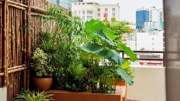 Signature Double Room, 1 Queen Bed, City View | Free minibar items, in-room safe, desk, blackout drapes