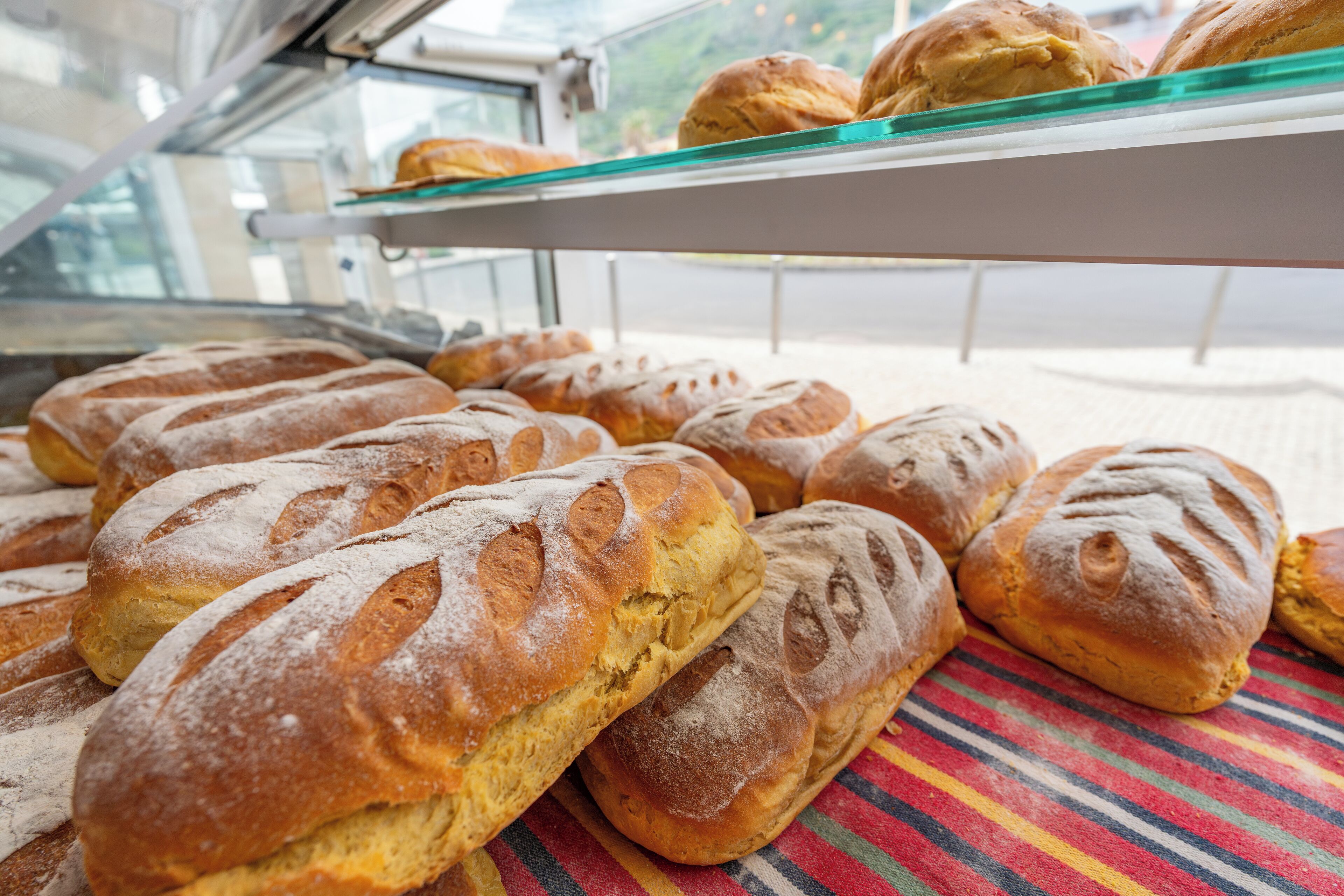 A display of freshly baked bread in a bakery.