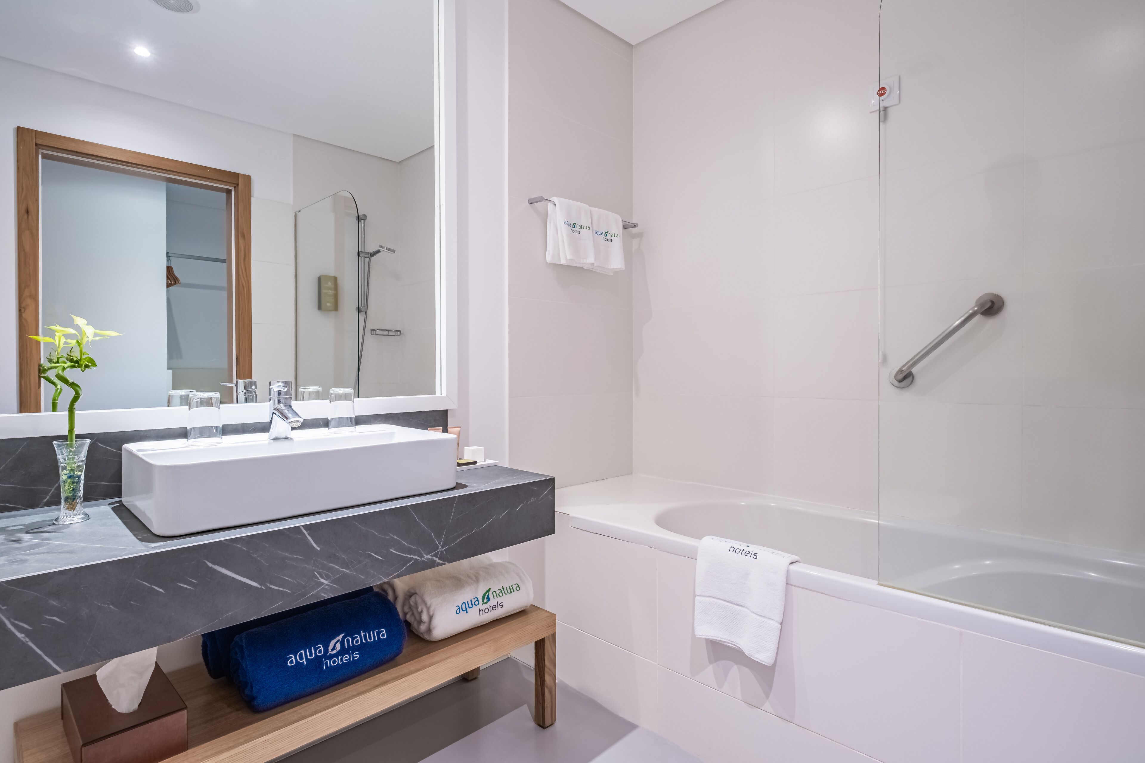 twin room | bathroom | rainfall showerhead, free toiletries, hair dryer, bathrobes