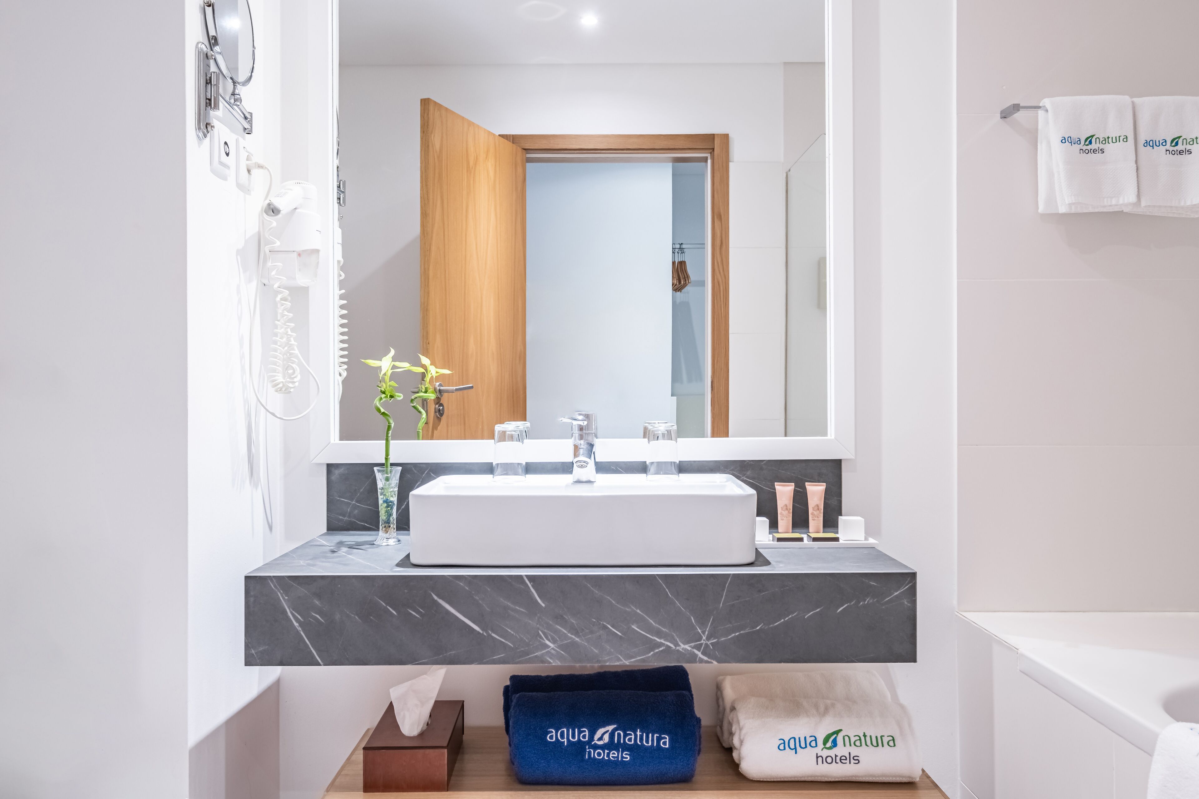 twin room | bathroom | rainfall showerhead, free toiletries, hair dryer, bathrobes