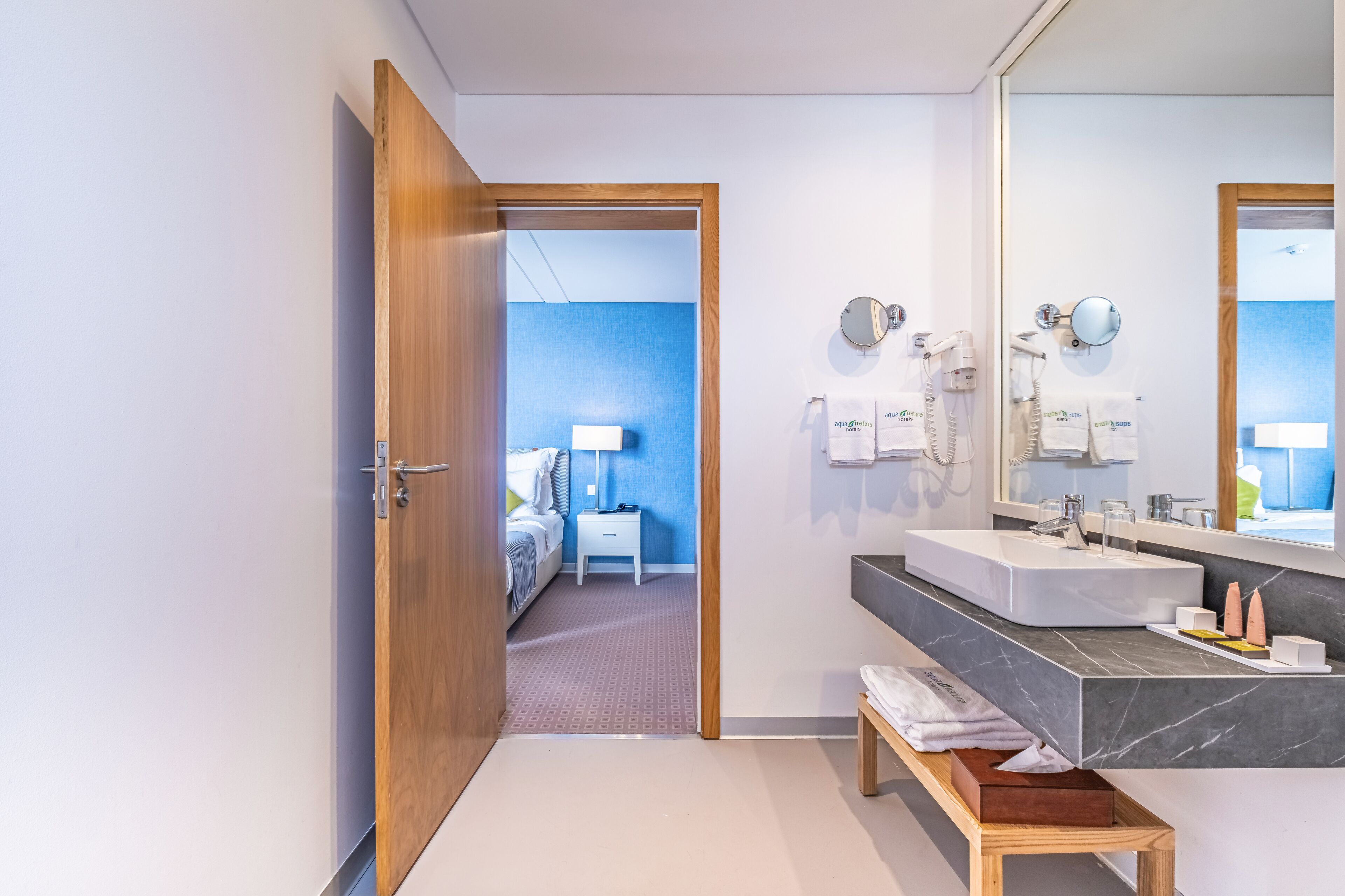 twin room | bathroom | rainfall showerhead, free toiletries, hair dryer, bathrobes