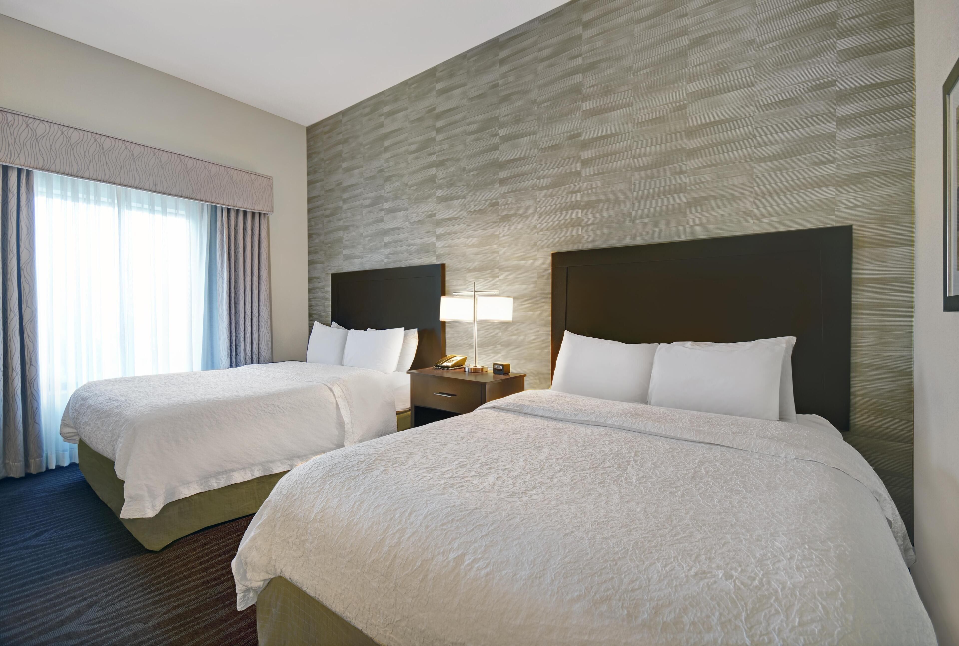 Premium bedding, free WiFi, bed sheets, alarm clocks