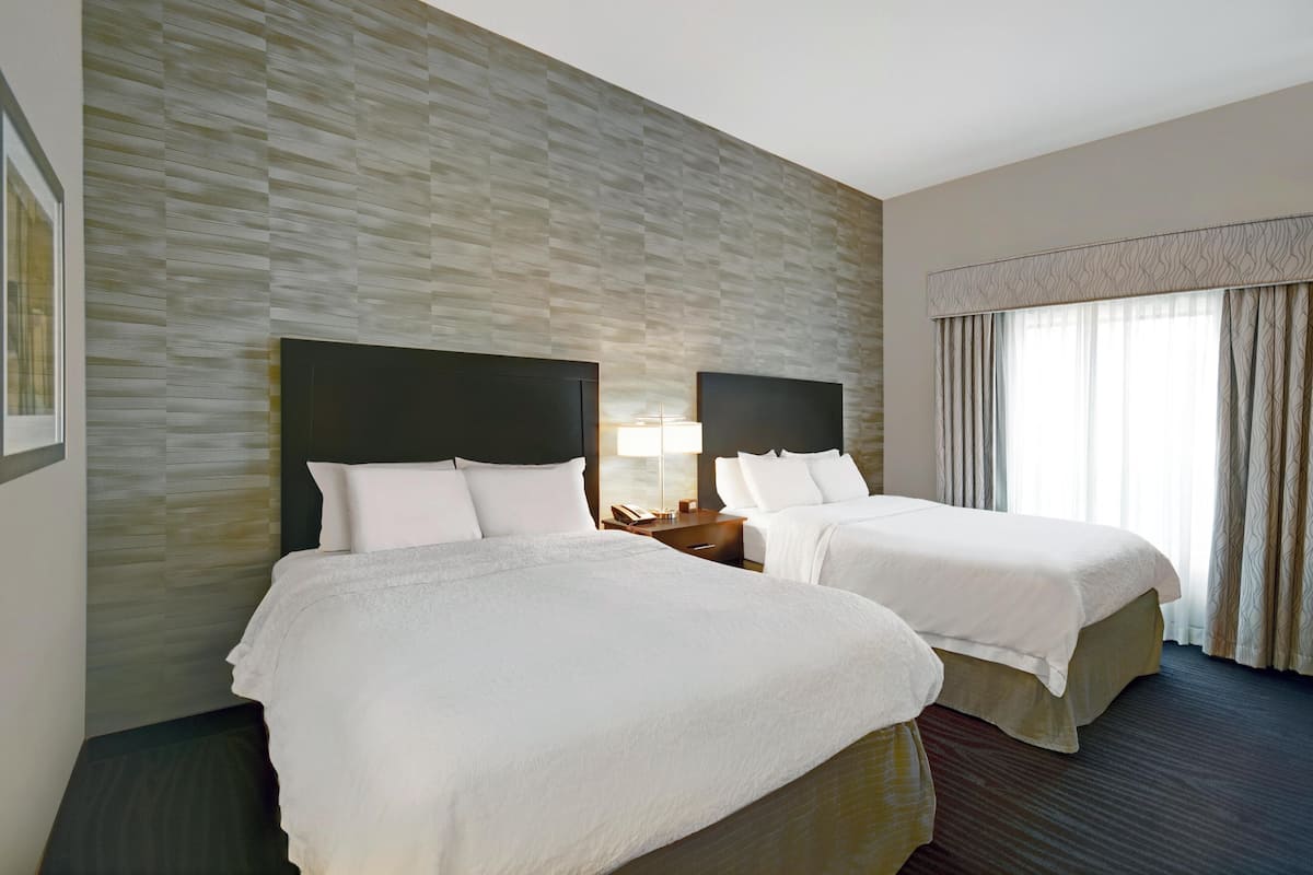 Premium bedding, free WiFi, bed sheets, alarm clocks