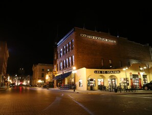 A historic building with a sign reading "Martin & Mason Hotel" and "Lee St. Station" on the ground floor. - Martin & Mason Hotel (Deadwood)