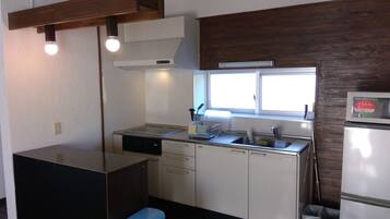 Cottage | Private kitchen | Fridge, microwave