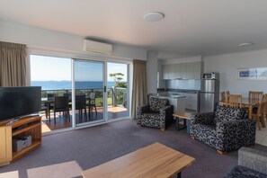 Two Bedroom Premier View | Living area | Flat-screen TV - Amooran Oceanside (Narooma)