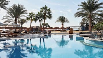 2 outdoor pools, pool umbrellas, pool loungers