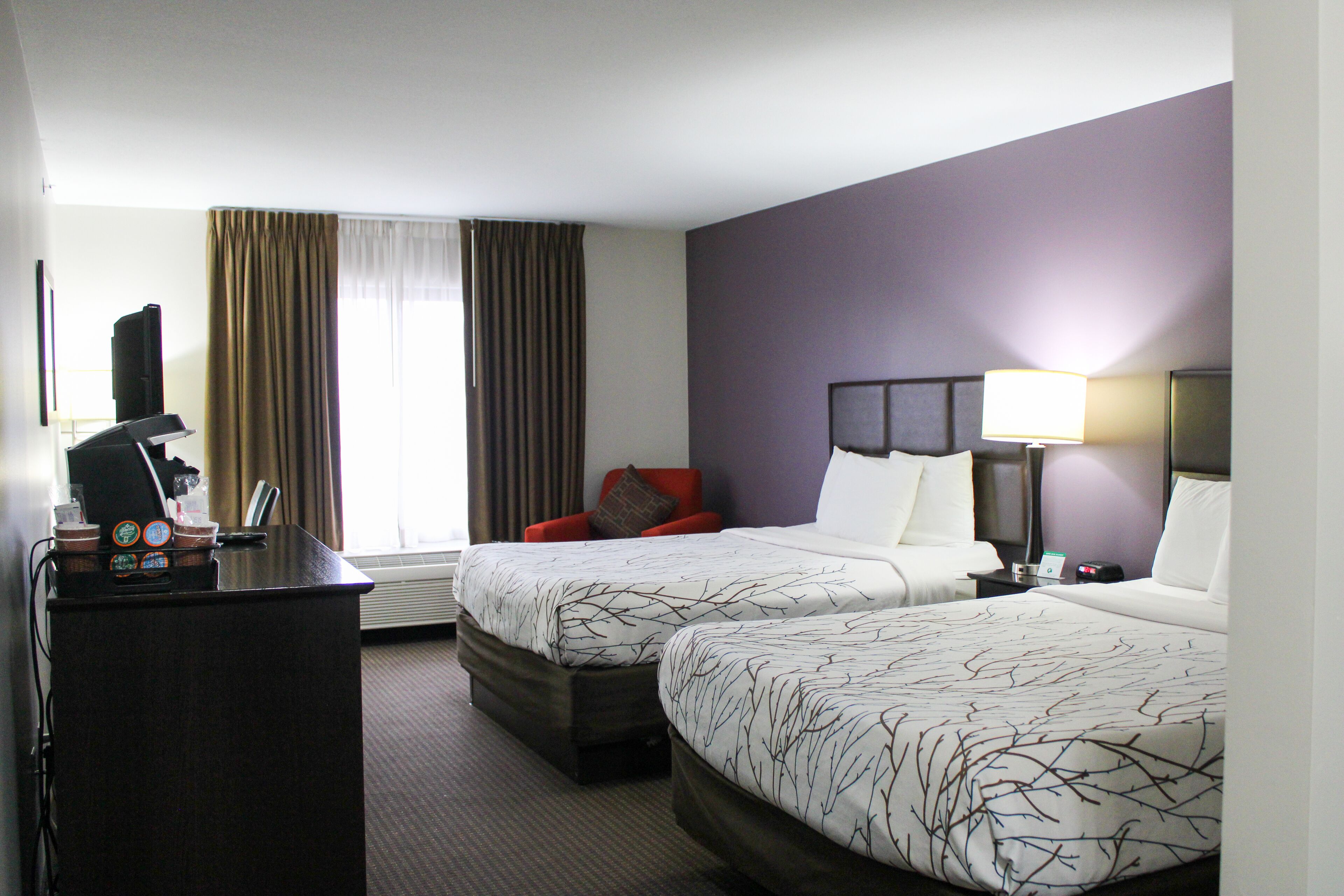 premium bedding, tempur-pedic beds, desk, blackout curtains