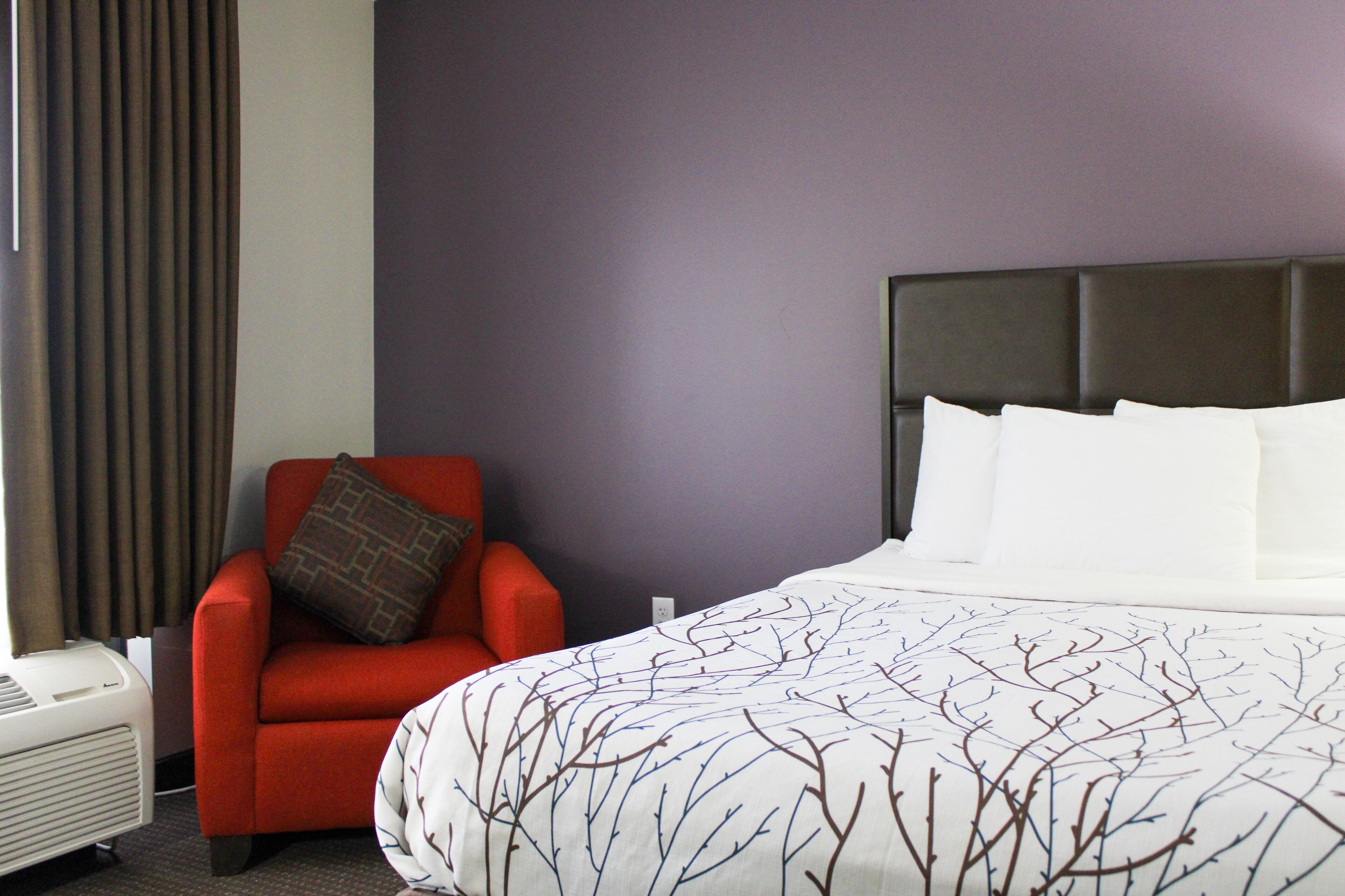 premium bedding, tempur-pedic beds, desk, blackout curtains