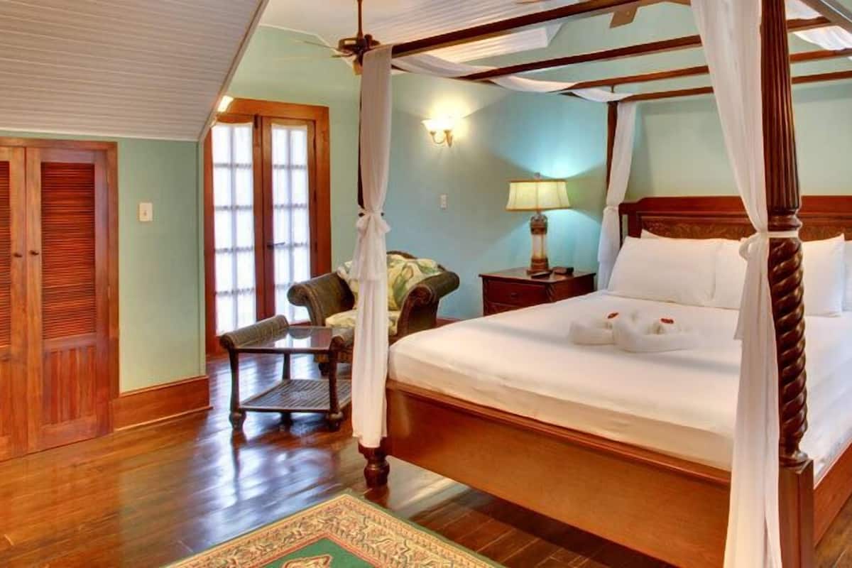 Executive suite | Verduisterende gordijnen, extra bedden, beddengoed